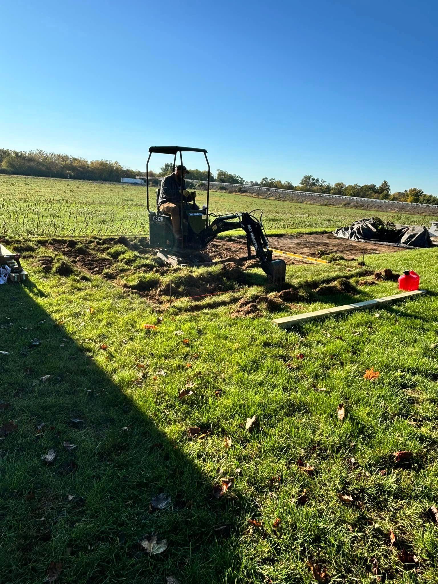 Excavator digging earth at an excavation site